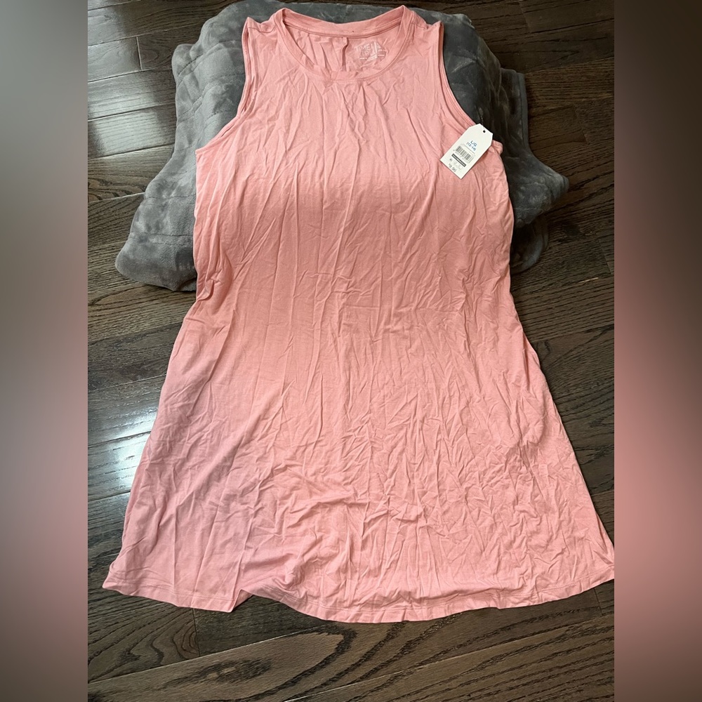 Dress, never worn, sleeveless, w/pockets, flares at bottom, pink